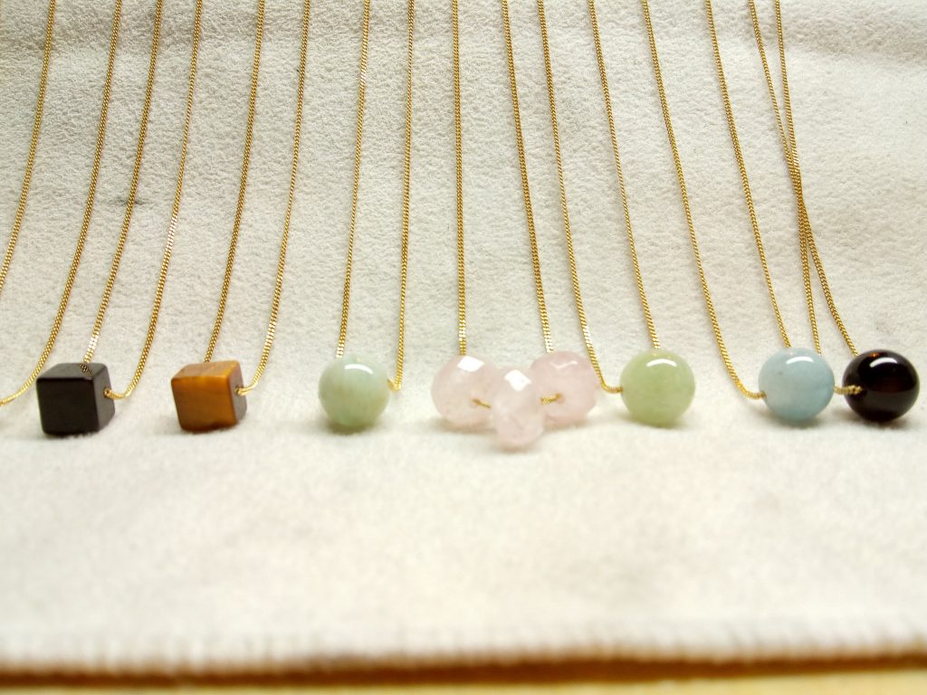 Various aurelia bead gold necklaces