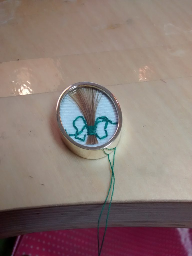 Heirloom locket - to store a lock of hair.