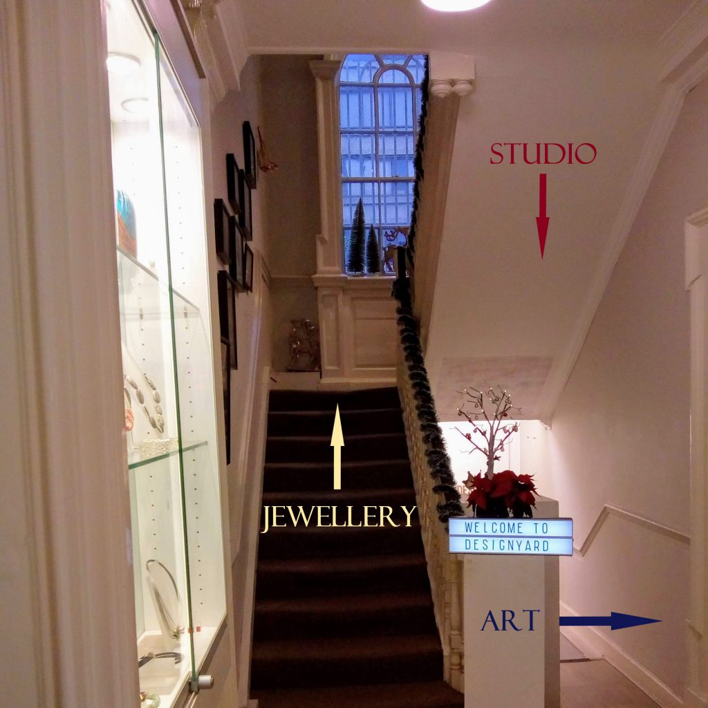 Upstairs for jewellery, downstairs for studio, art to the right