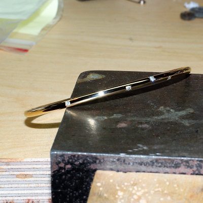 9k yellow gold oval bangle bead set with diamonds reclaimed from customers old jewellery